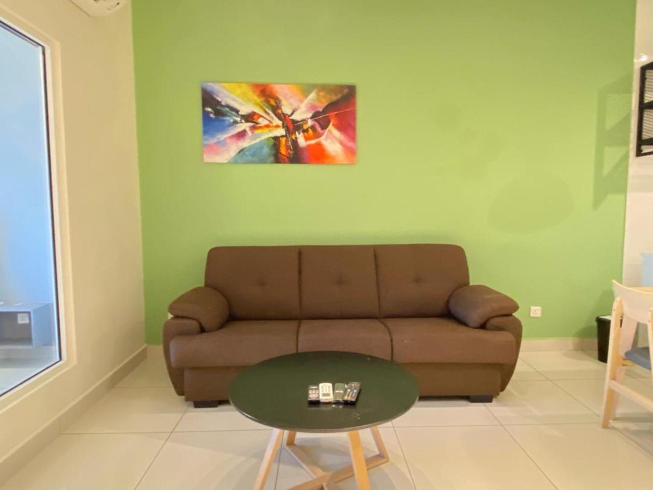 Arte Mont Kiara Kuala Lumpur Exterior foto A living room with a sofa
